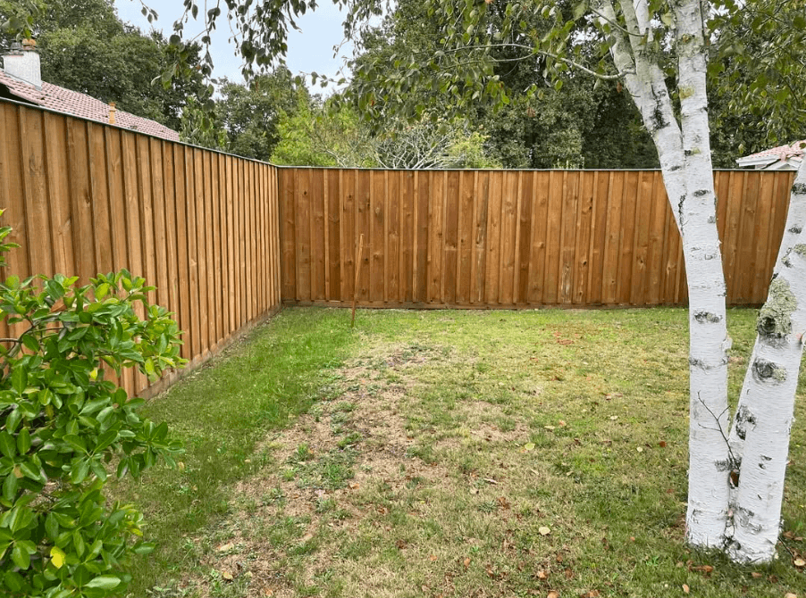Clôture de jardin en bois — réalisation extérieure